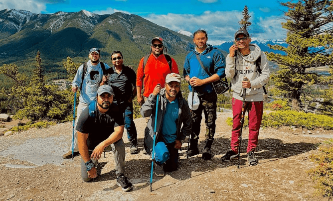 Duronto Hikers members posing together on a sunny day in the mountains
